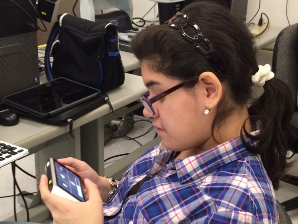 Student of The New York Institute for Special Education NYISE trying Zoomax low vision aid