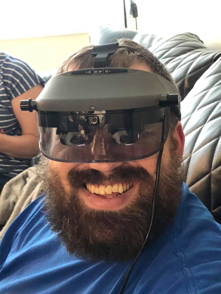 Tanner wearing Acesight electronic glasses for low vision